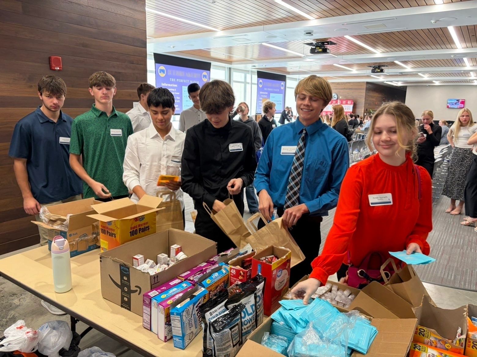 South Dakota FBLA: students packing food and supplies for a service activity