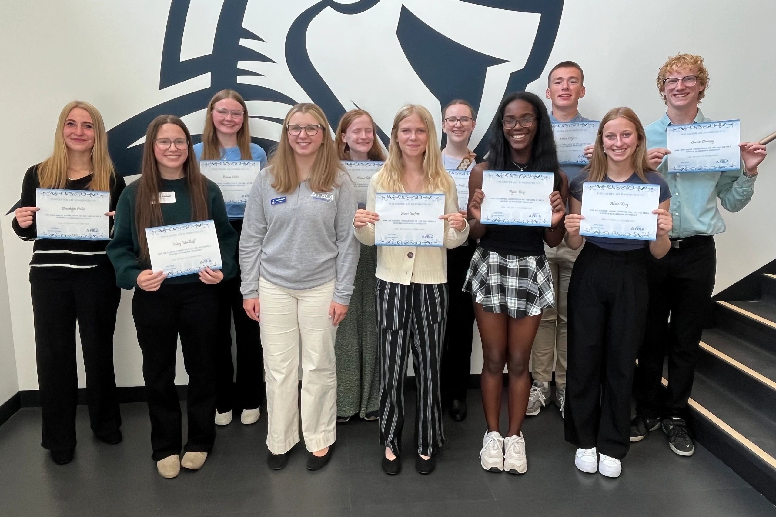 South Dakota FBLA: students displaying certificates