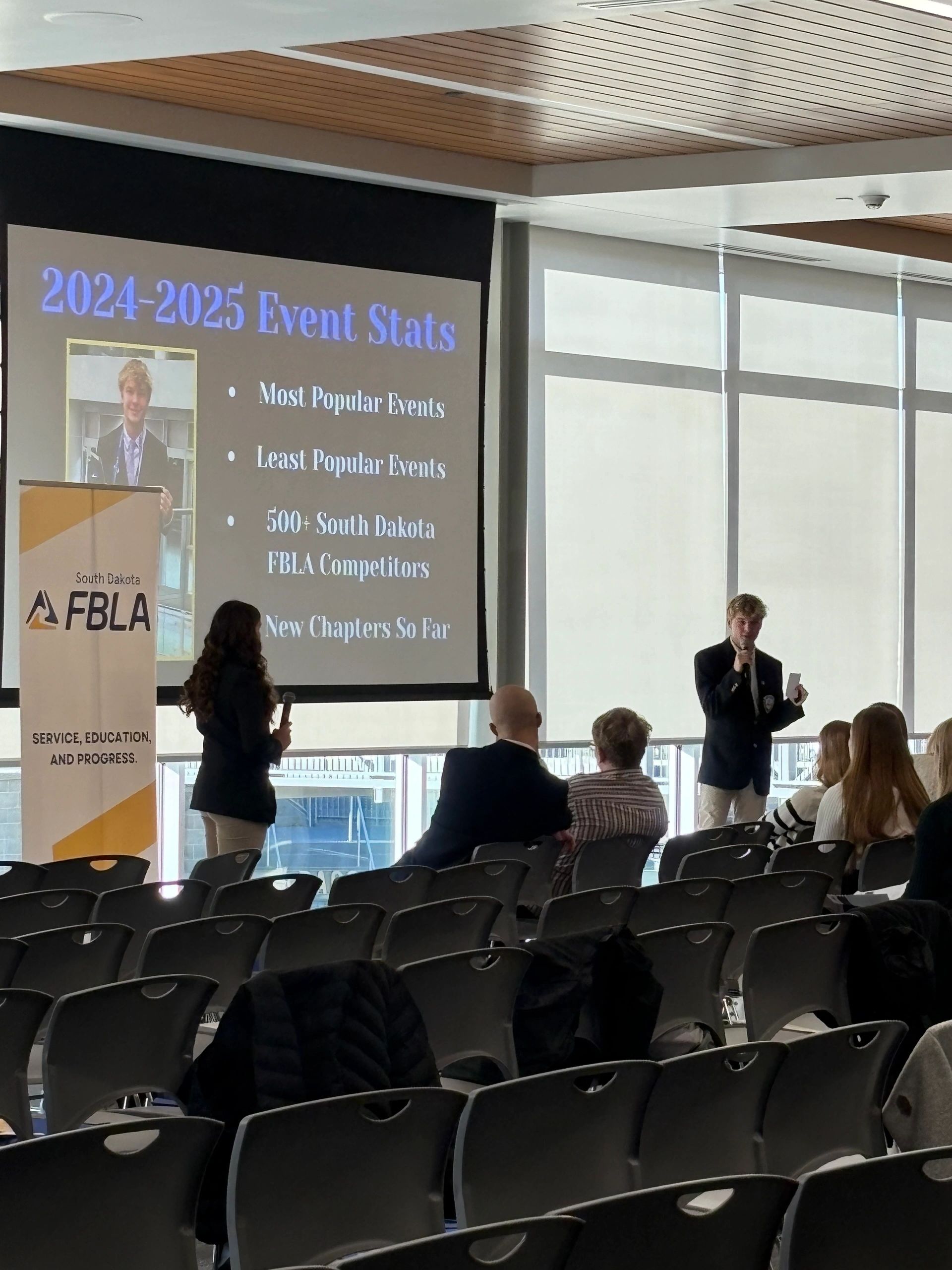 South Dakota FBLA: students attending a presentation in a conference room