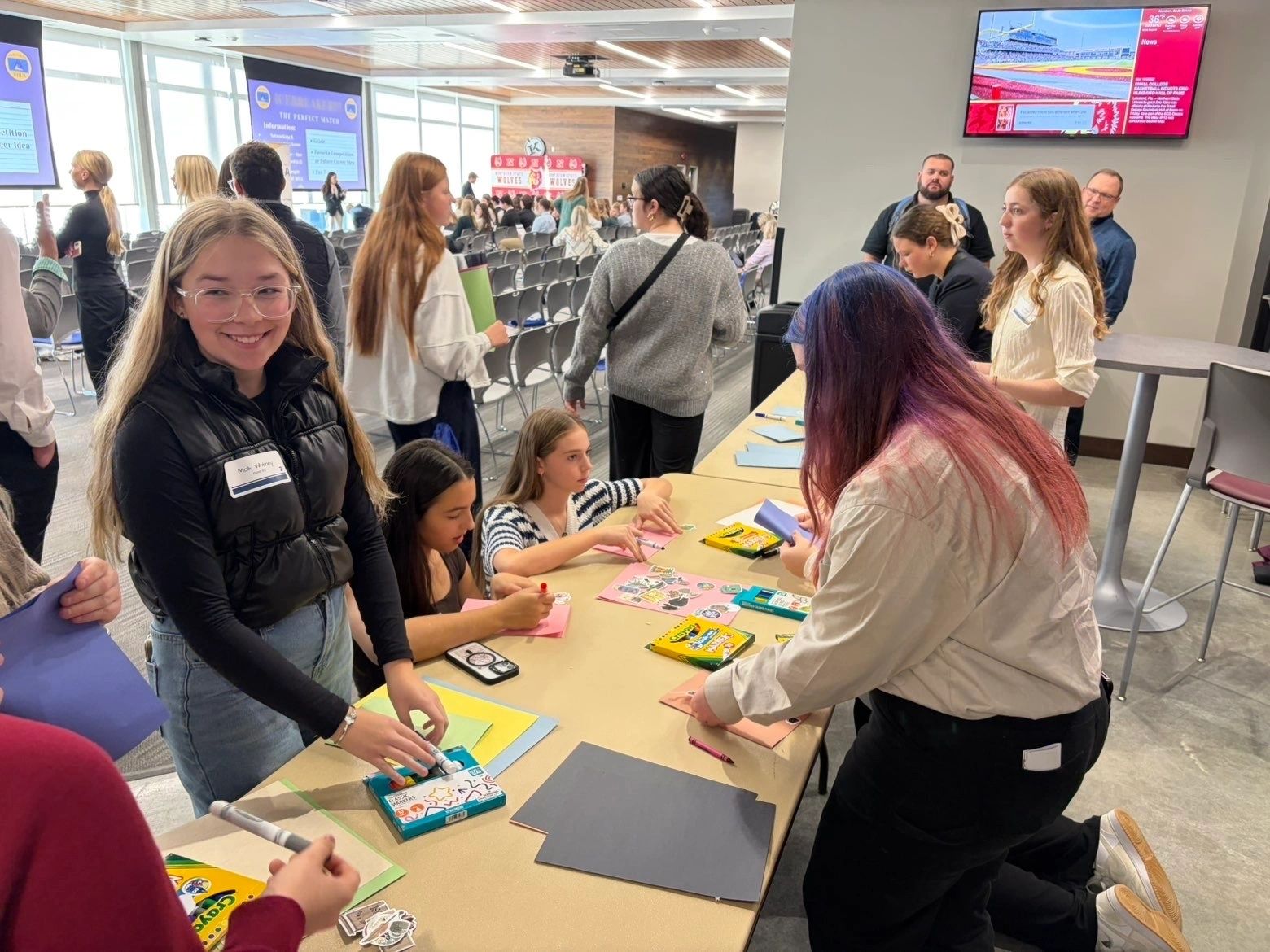 South Dakota FBLA: members preparing supplies at a service table