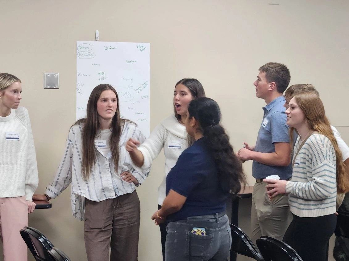 South Dakota FBLA: students discussing a chapter activity