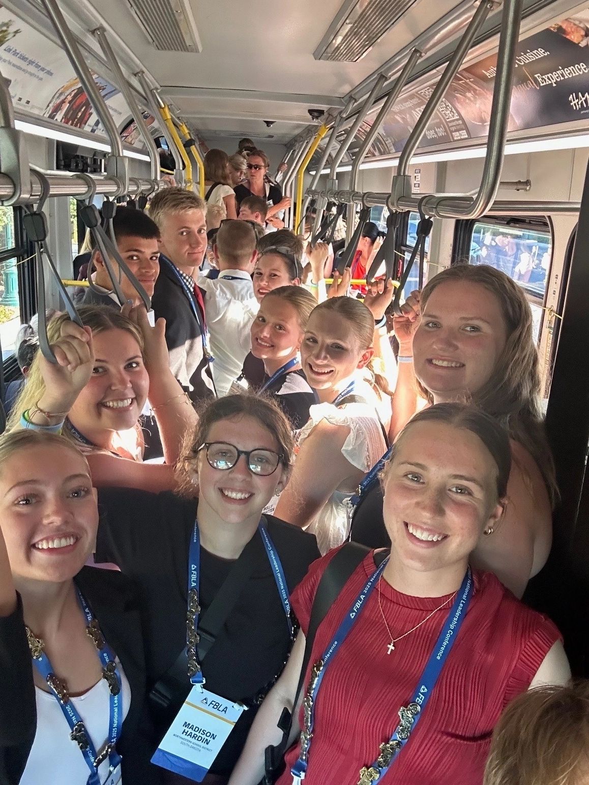 South Dakota FBLA: members taking a group selfie on a bus