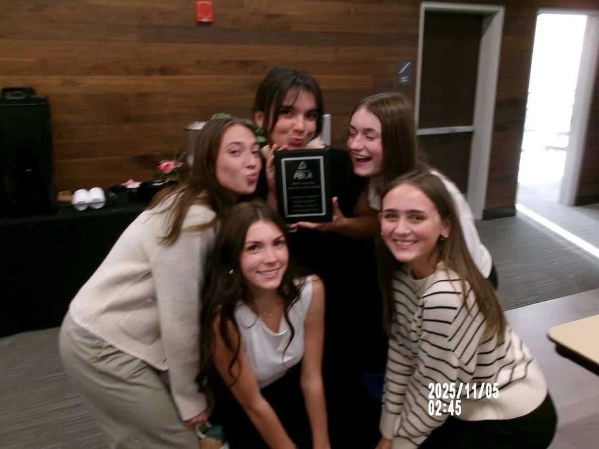 South Dakota FBLA: members posing together indoors